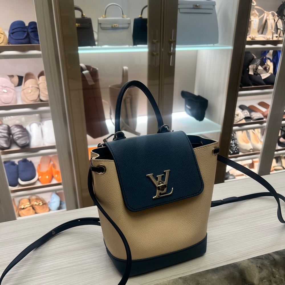 LOUIS VUITTON
Blue/Ivory Calfskin Leather Mini Lockme Backpack Bag